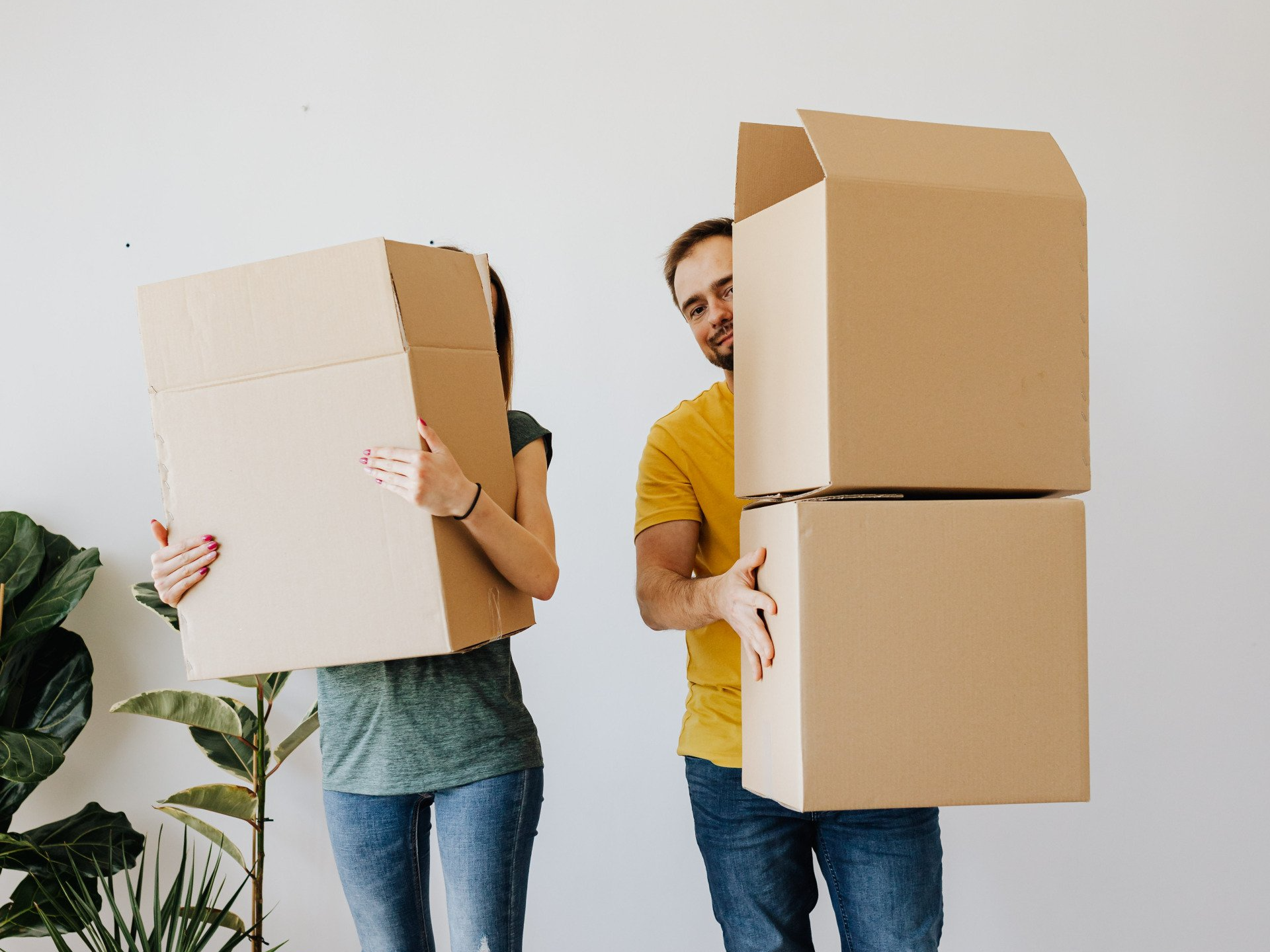 San Angelo, TX Residents Moving Boxes to Storage Building