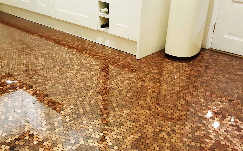 Beautiful resin coins effect flooring