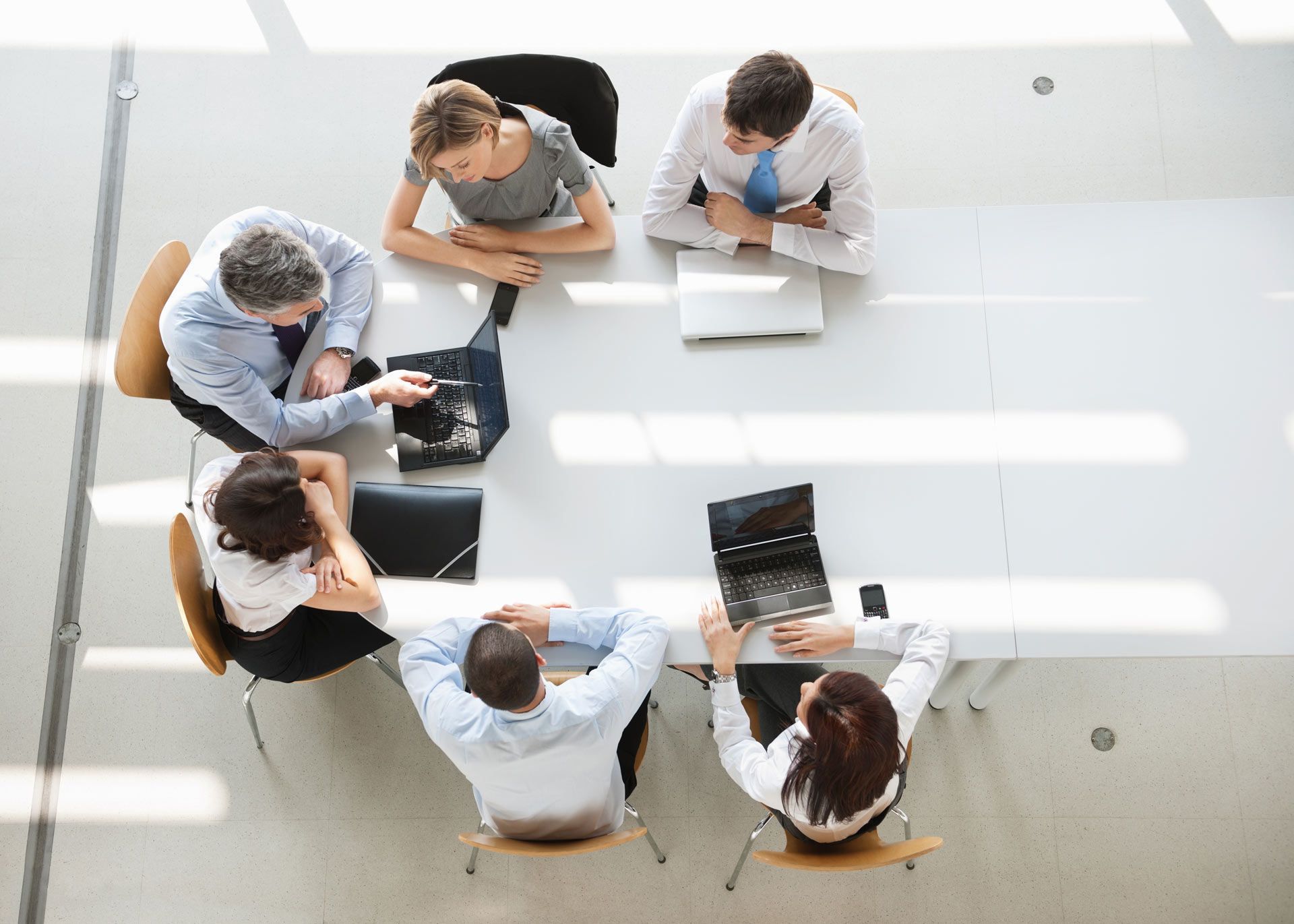 Overhead View of Business People in a Meeting | Brisbane Qld | Mta-More Than Accountants Pty Ltd Overhead View of Business People in a Meeting | Brisbane Qld | Mta-More Than Accountants Pty Ltd