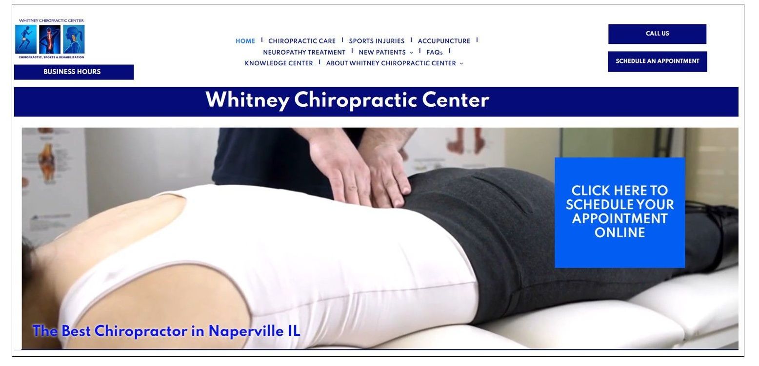 Chiropractor adjusting a patient's back at the Whitney Chiropractic Center in Naperville, IL.
