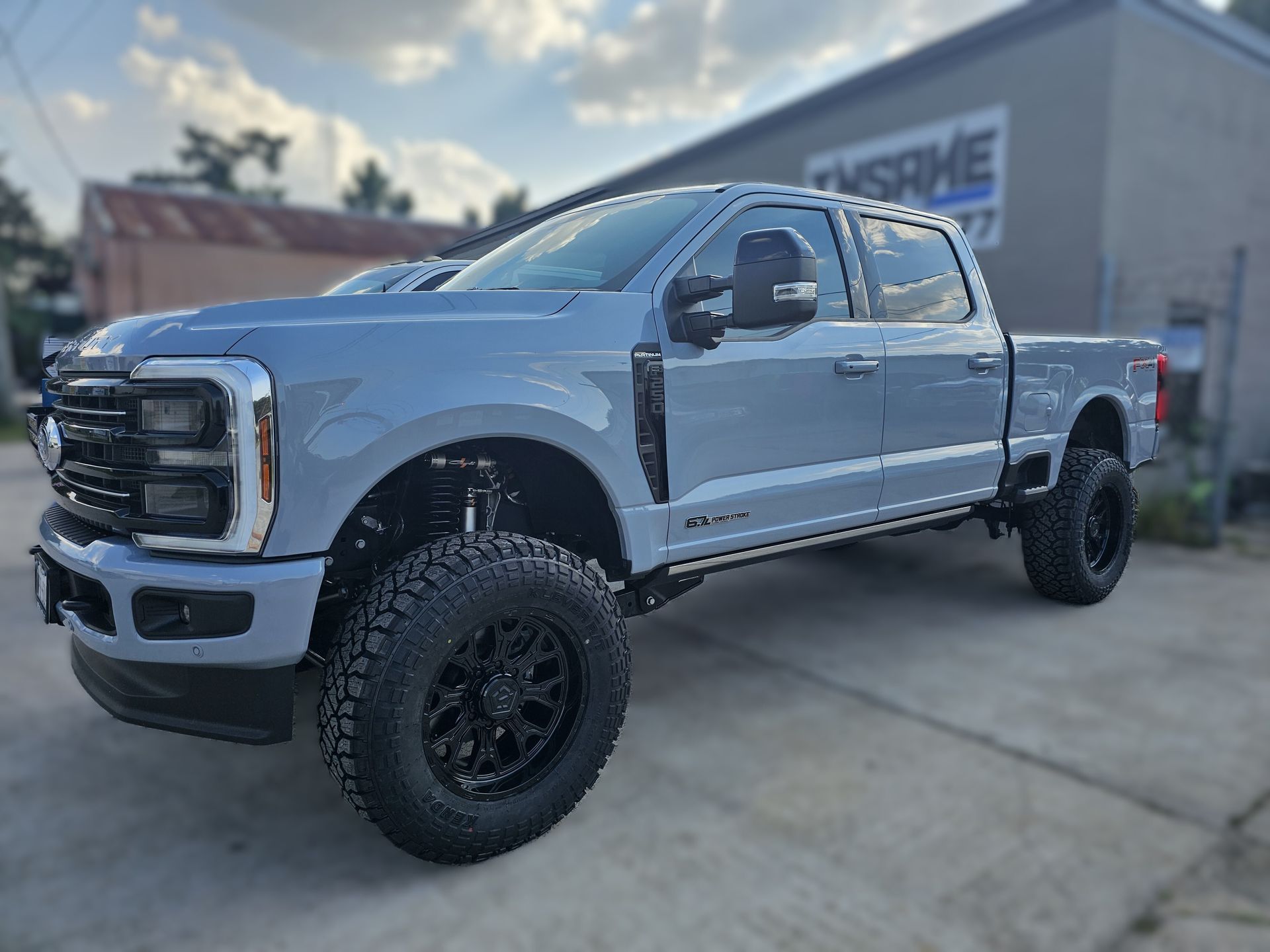 Light-gray Ford Super Duty Pickup Truck | Insane Automotive and Offroad