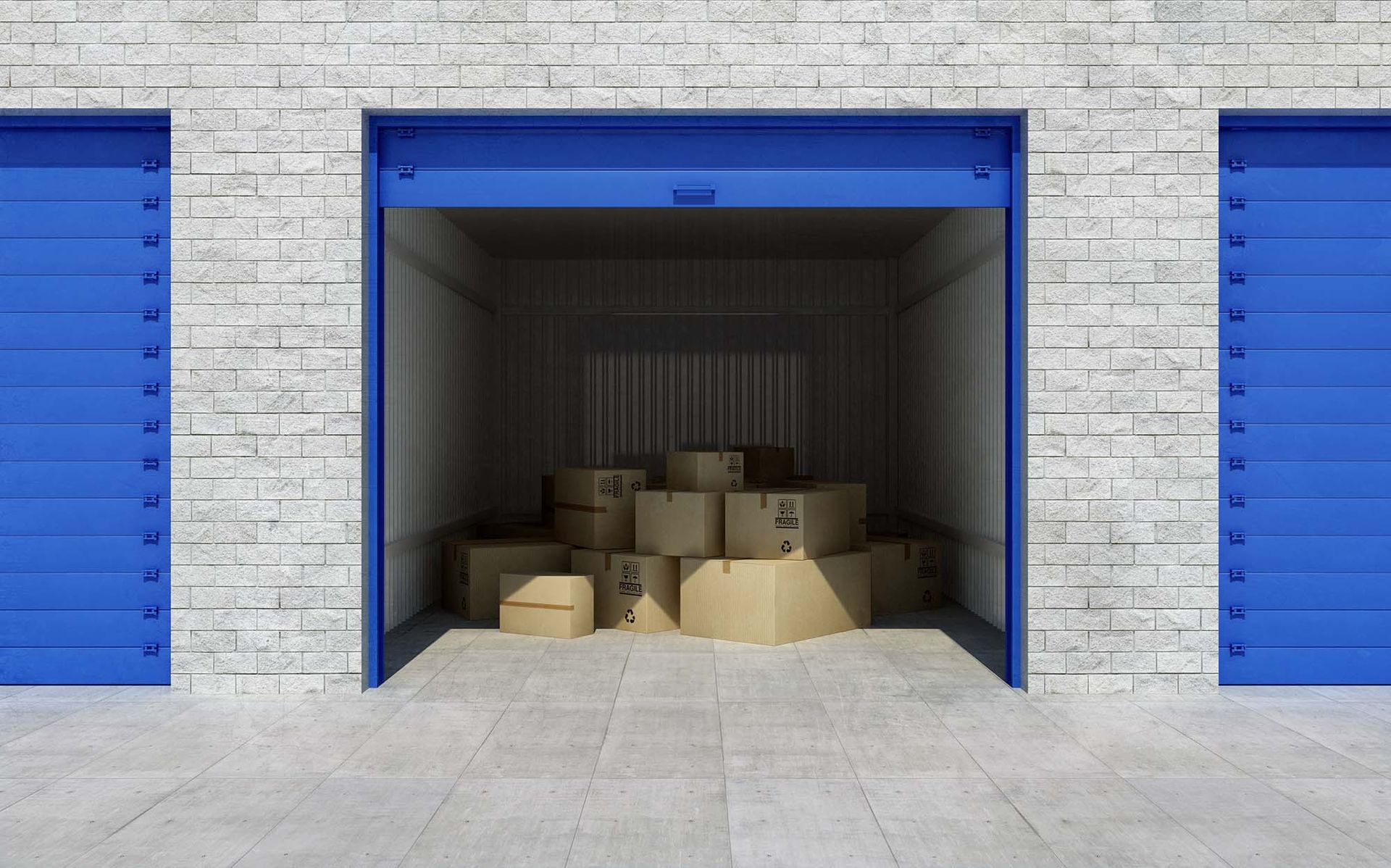 Open blue storage unit with cardboard boxes inside, between blue doors and a light stone wall.