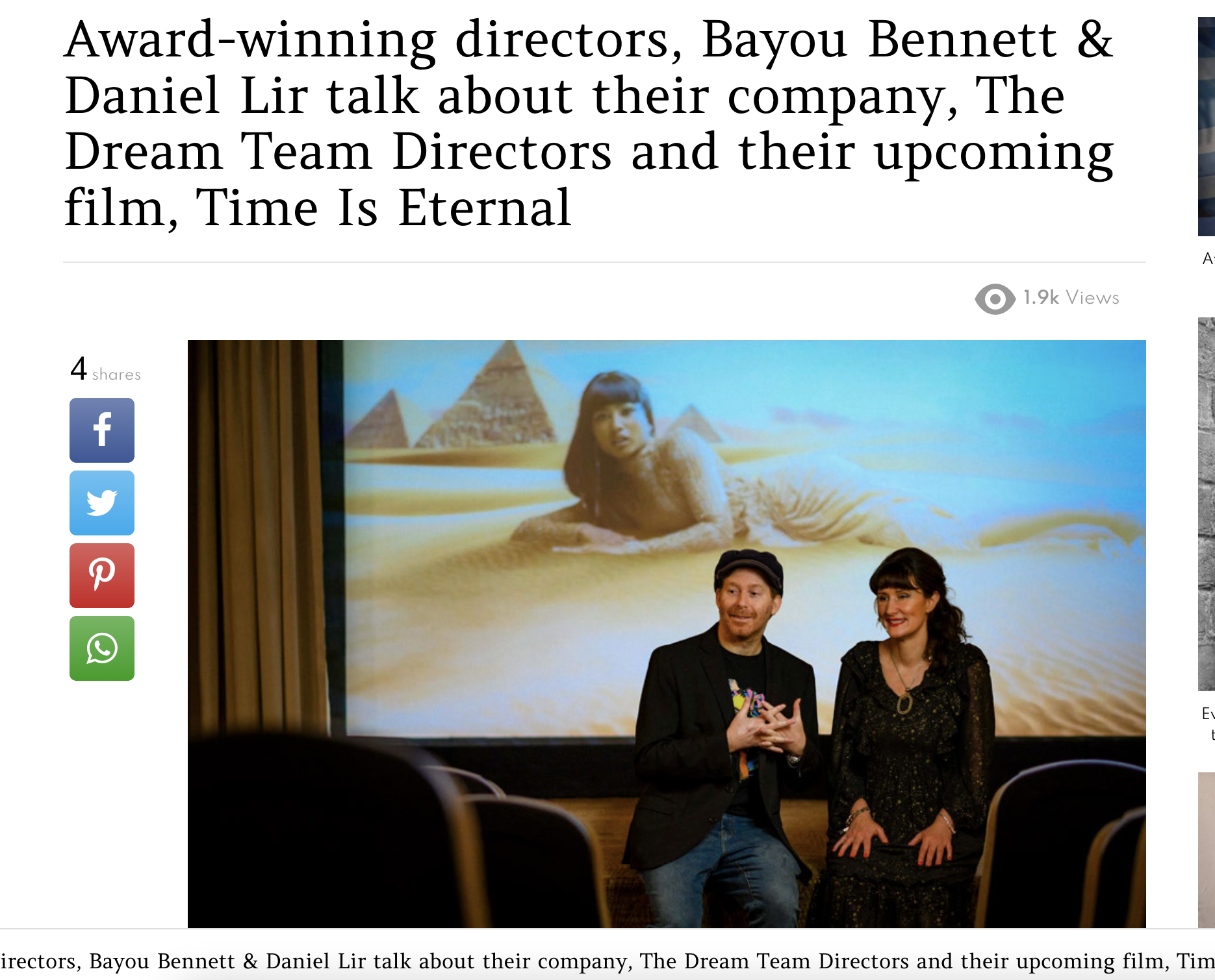 A man and a woman are sitting in front of a screen talking about their company.