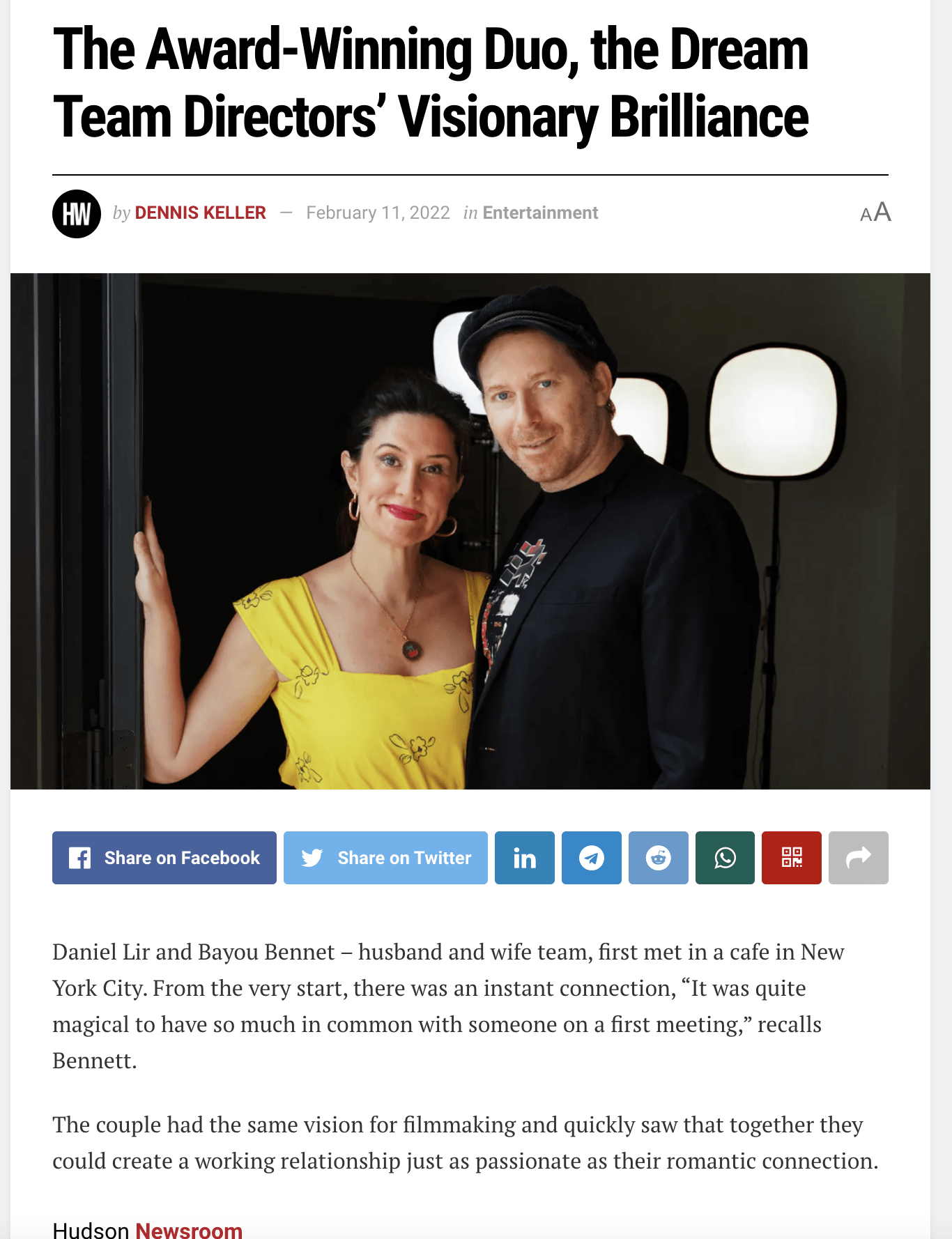A man and a woman are standing next to each other on a website.