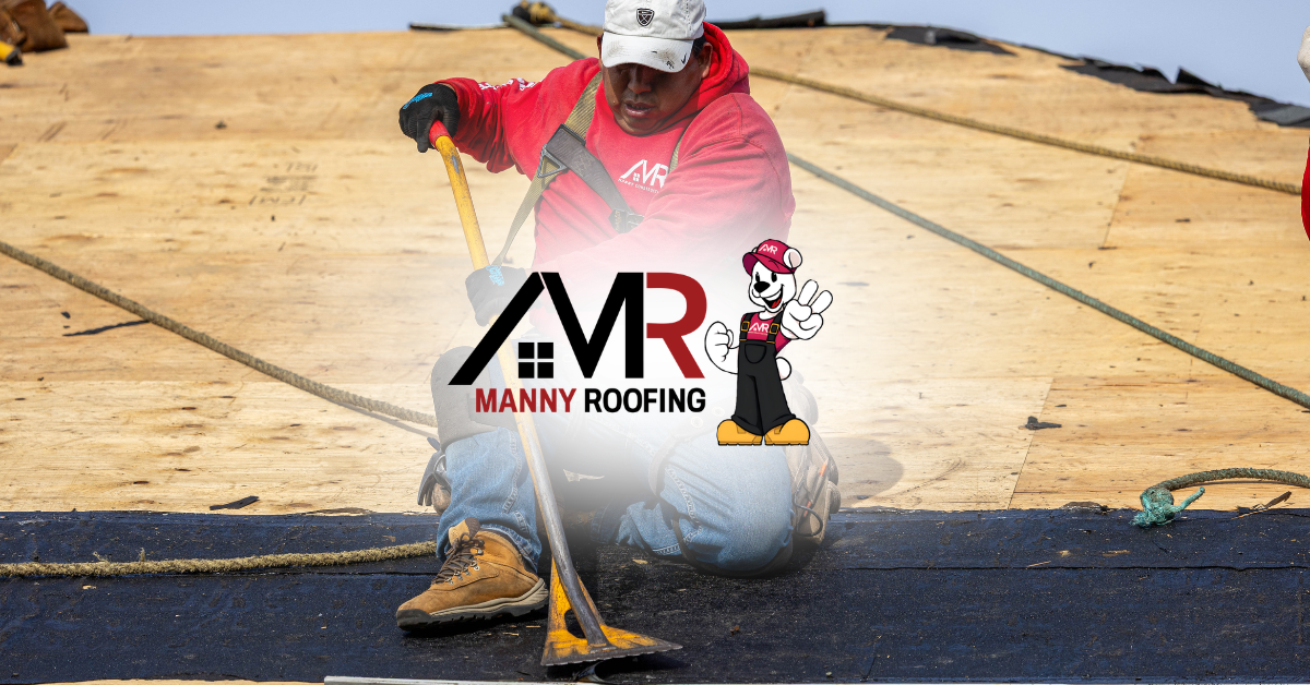 Worker in red jacket using a broom on a roof with Manny Roofing logo.