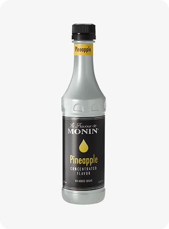 Bouteille de sirop Monin à saveur d'ananas avec bouchon noir et étiquette jaune sur fond blanc