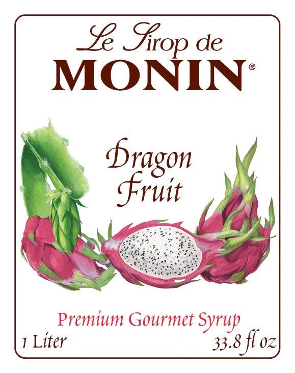 Bouteille de sirop de fruit du dragon Monin avec étiquette blanche et liquide rouge à l'intérieur