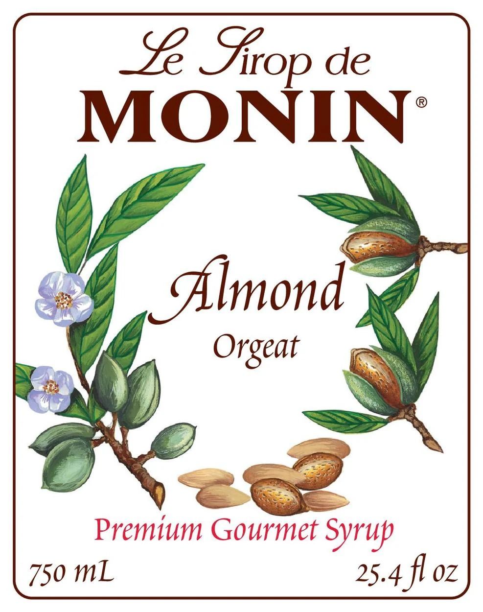 Bouteille de sirop d'amande Monin avec étiquette blanche et bouchon rouge sur fond blanc