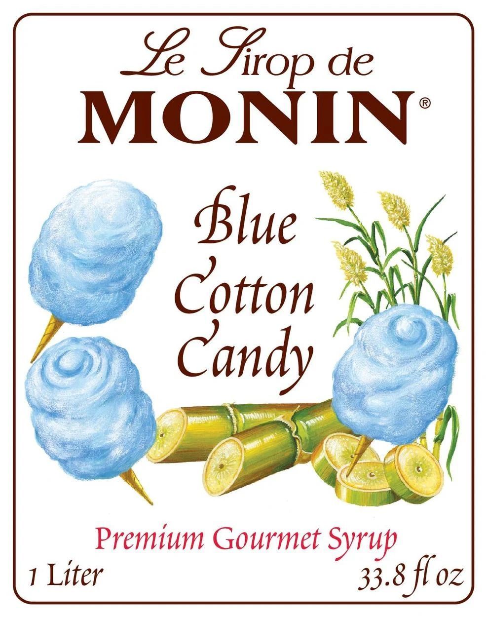 Bouteille de sirop Monin Blue Curaçao bleue avec bouchon noir et étiquette blanche sur fond blanc