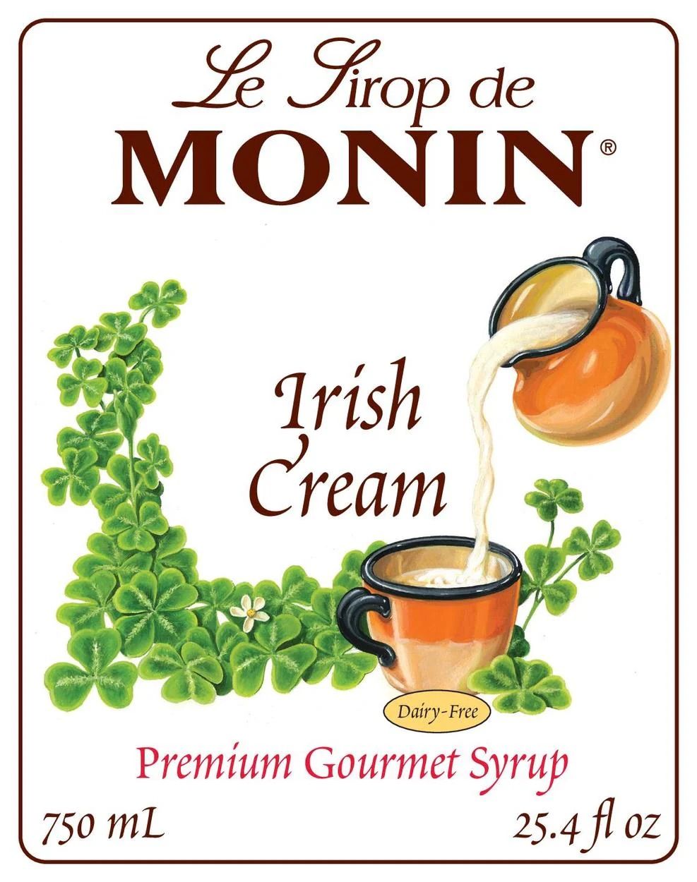 Bouteille de sirop Monin Irish Cream avec étiquette blanche et liquide rouge foncé sur fond blanc
