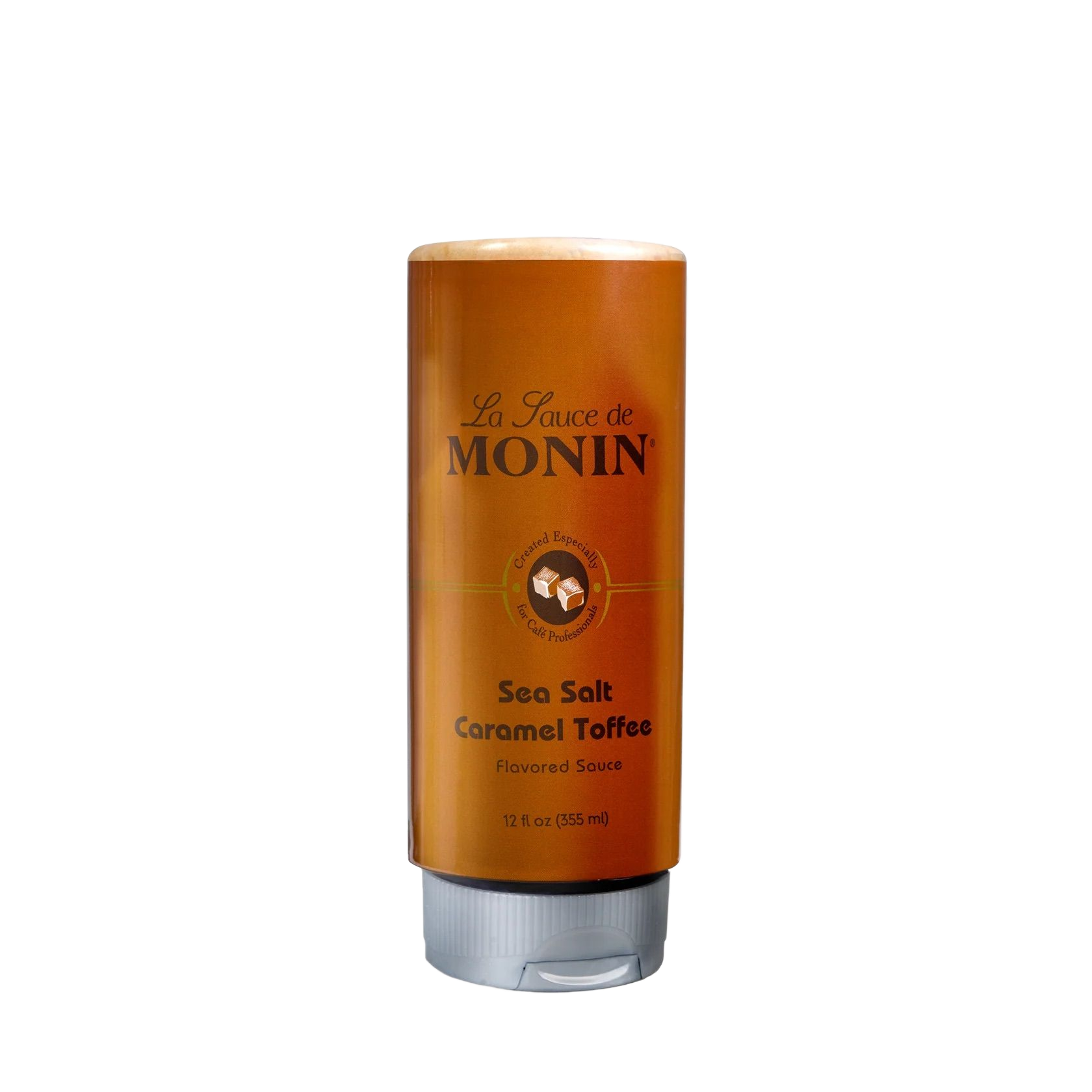 Bouteille de sirop Monin au caramel et sel de mer, étiquette orange et bouchon argenté