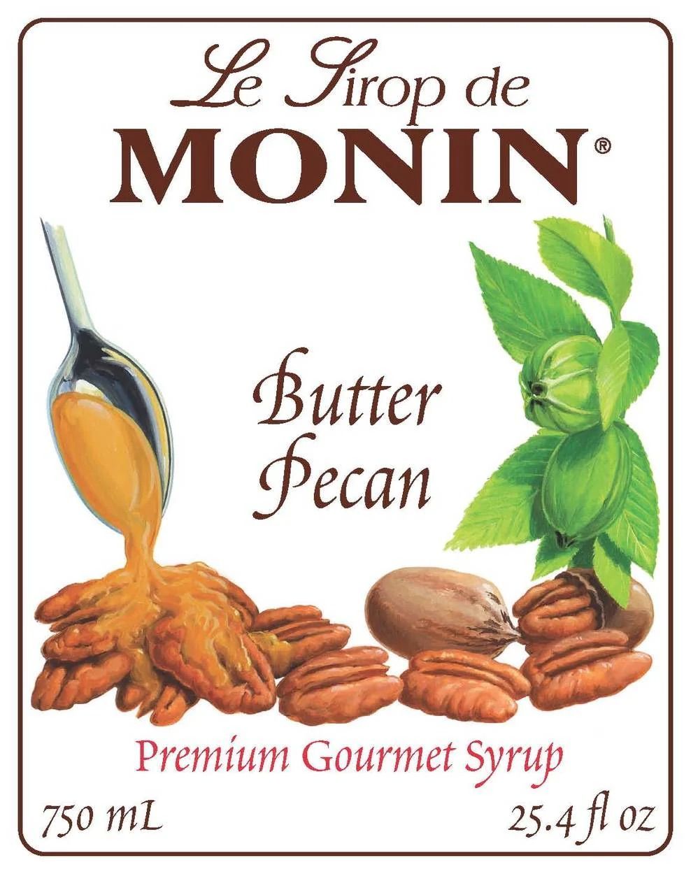 Bouteille de sirop de caramel sans sucre Monin, à liquide ambré et étiquette blanche sur fond blanc.