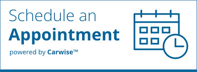 Blue “Schedule an Appointment” banner with calendar and clock icon, powered by Carwise.