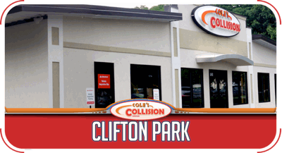 Clifton Park Collision storefront with white facade, orange signage, and large front windows