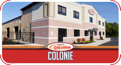Colonie Collision auto repair building exterior with red sign and beige brick facade