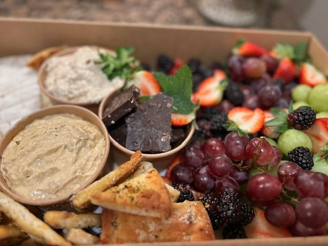 A box filled with a variety of fruits and vegetables.