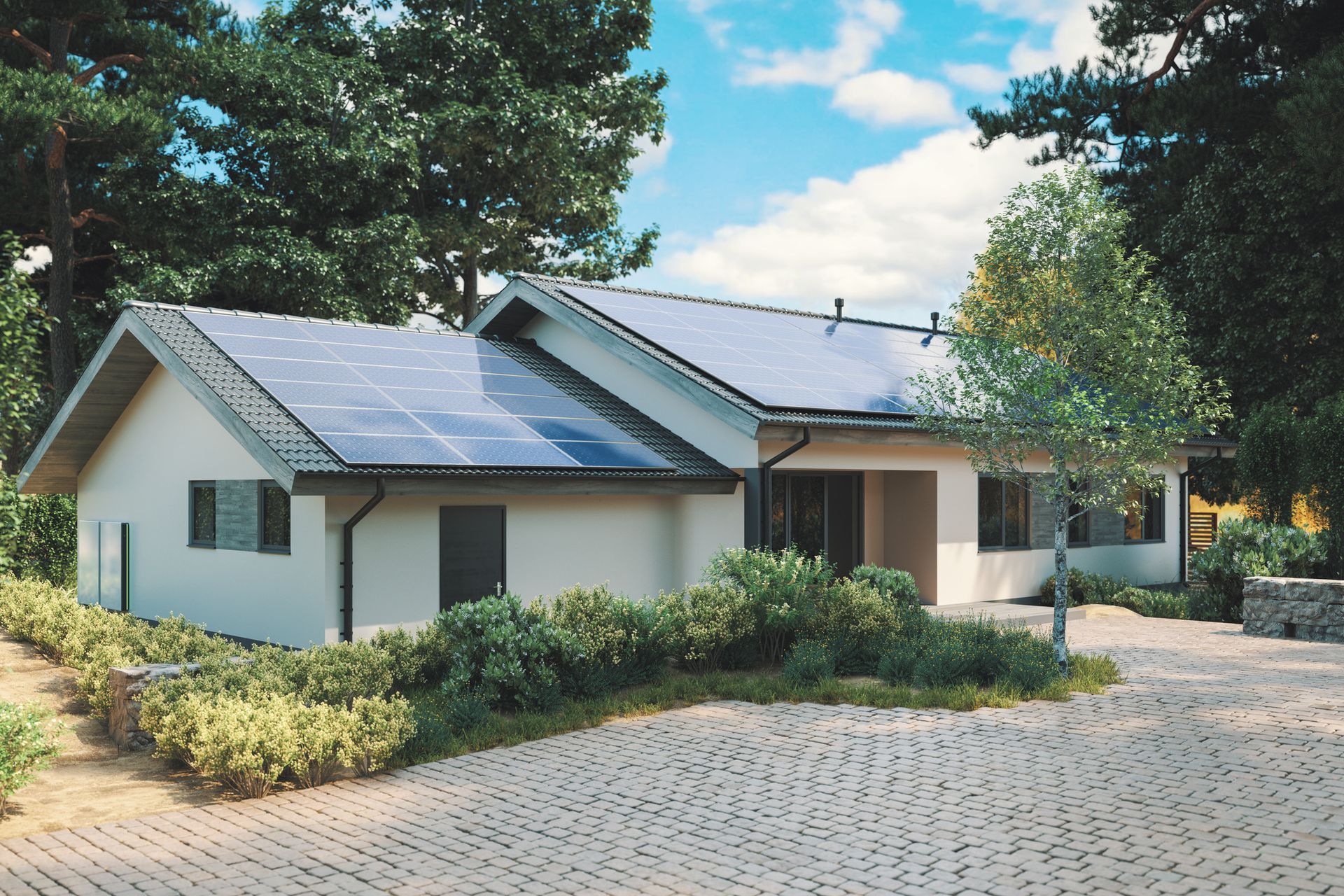 A white house with solar panels on the roof.