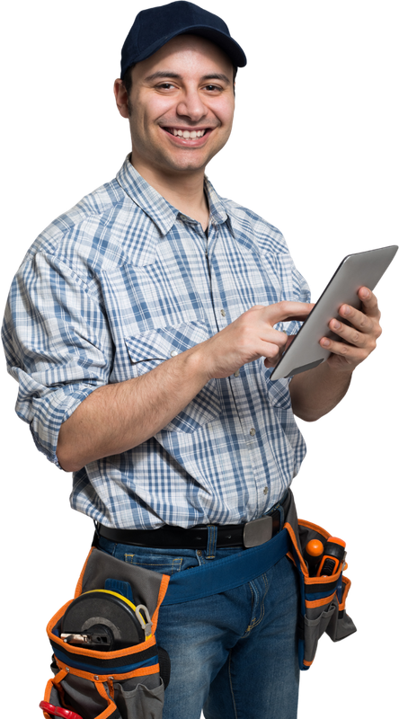 A man is holding a tablet and pointing at it.