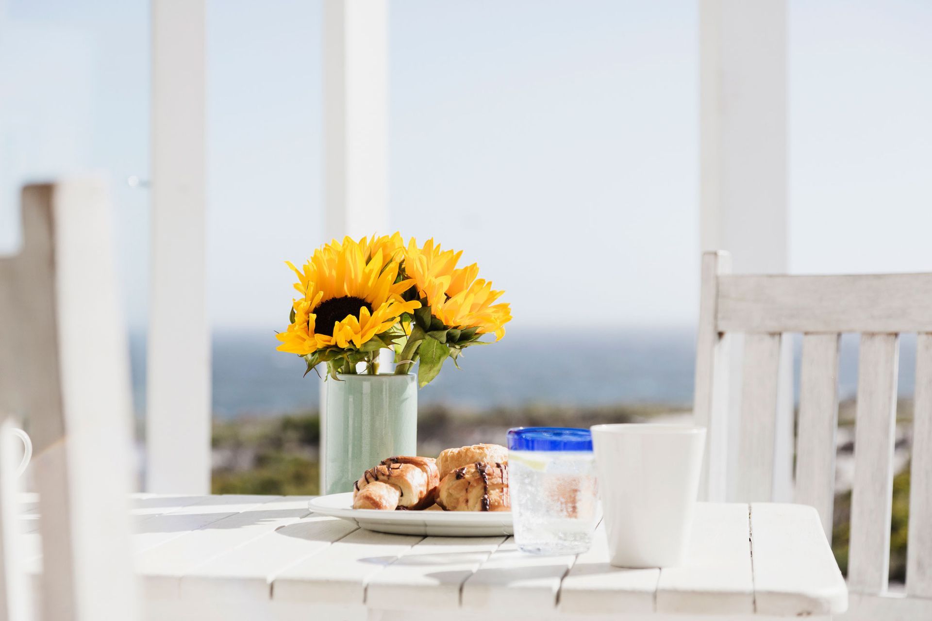 Photo of sunflowers in a vase - click to view the owners portal page