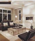 A living room filled with furniture and a fireplace.