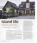 There is a picture of a house on the cover of a magazine.