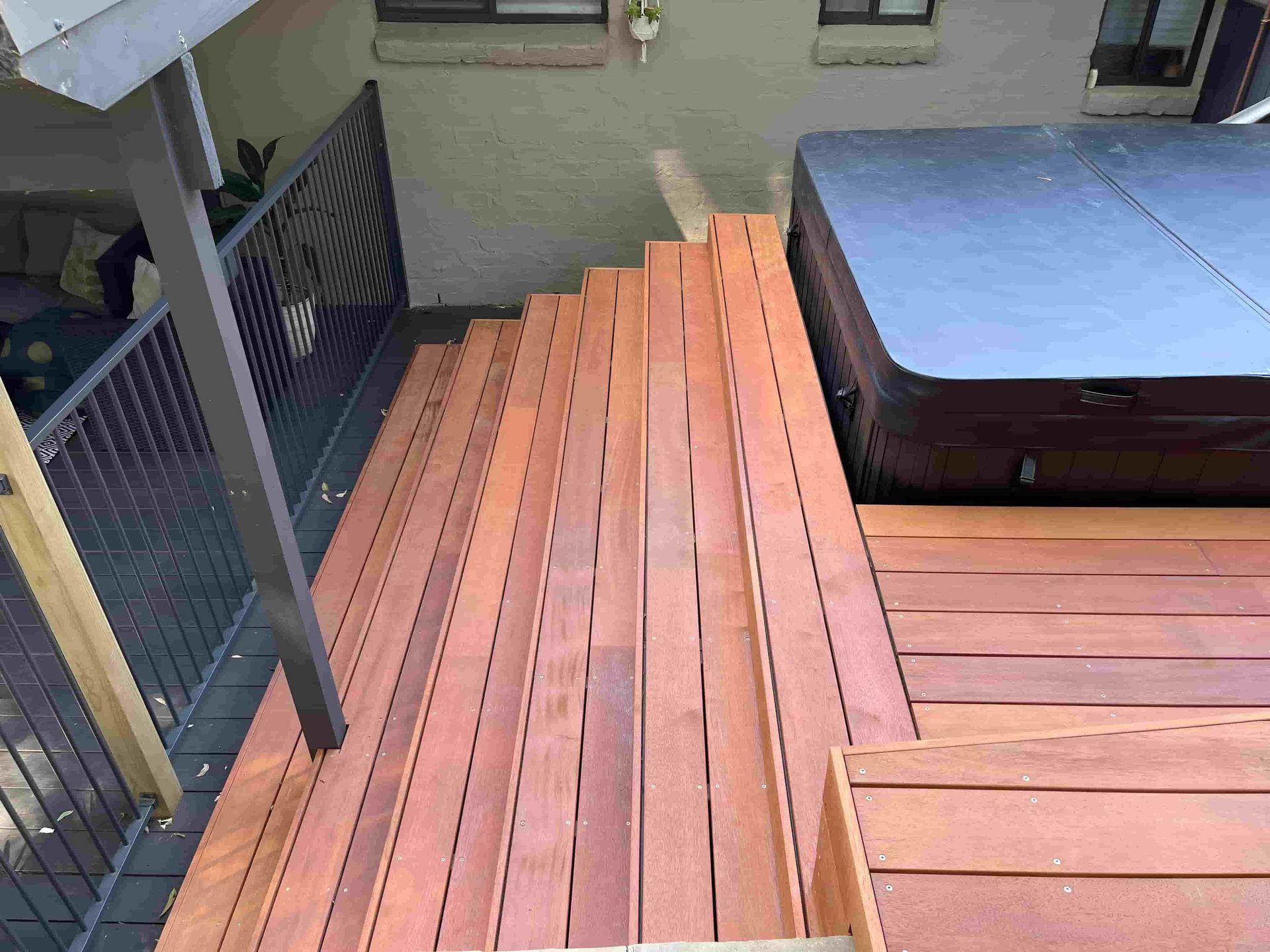 A Wooden Deck With a Pool — Pride Carpentry & Maintenance In Berkeley Vale, NSW