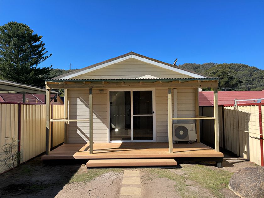 A House With a Deck and a Door — Pride Carpentry & Maintenance In Berkeley Vale, NSW
