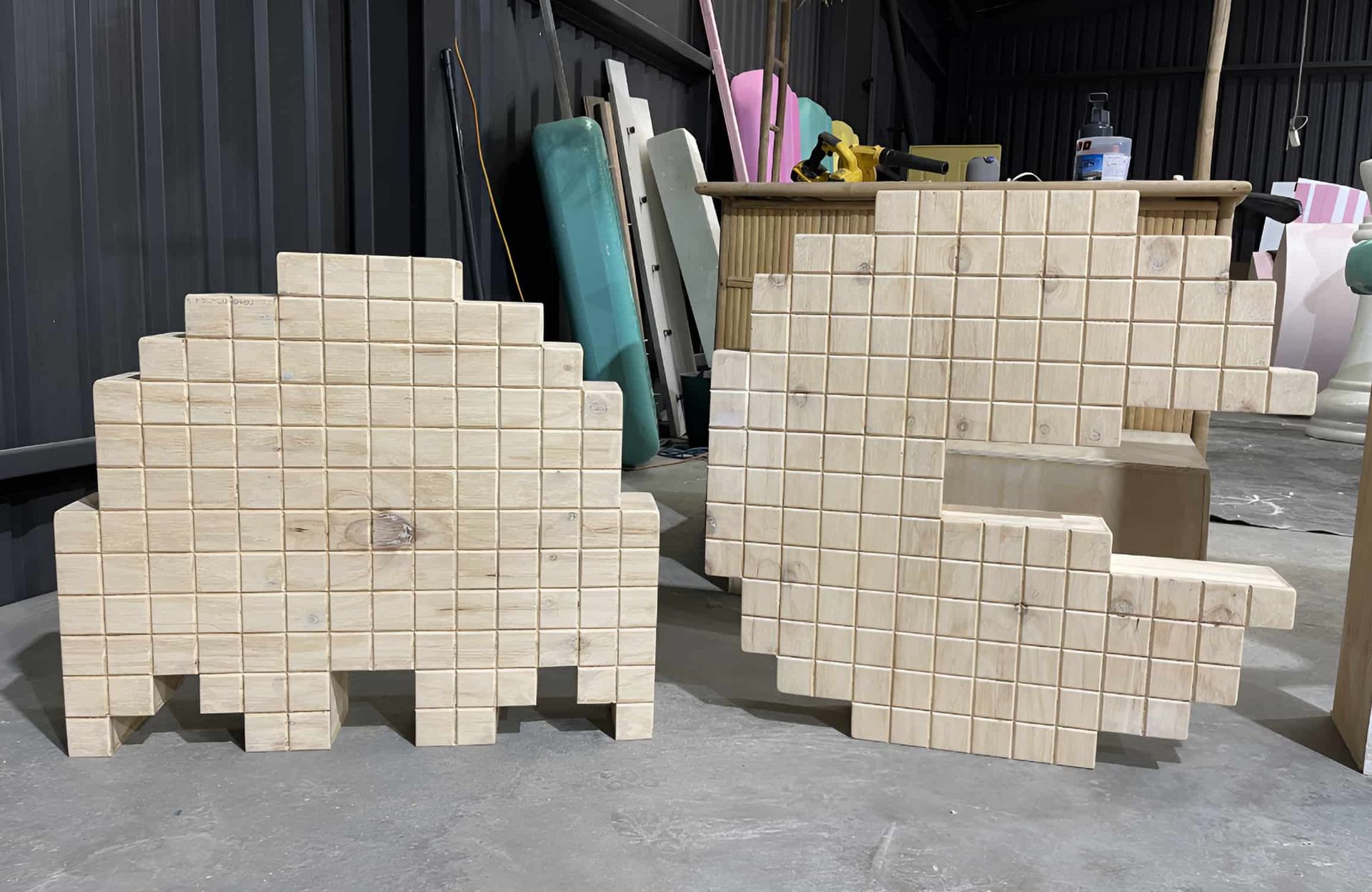 Two Pieces of Wood That Look Like Creatures — Pride Carpentry & Maintenance In Central Coast, NSW