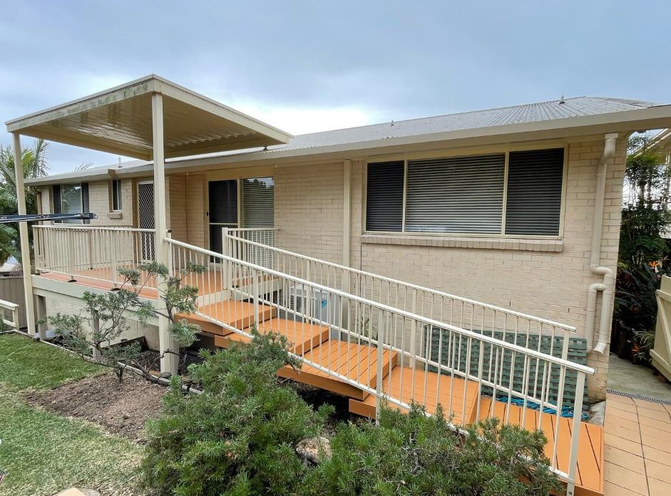 A House With a Ramp and Stairs Leading Up to It — Pride Carpentry & Maintenance In Berkeley Vale, NSW