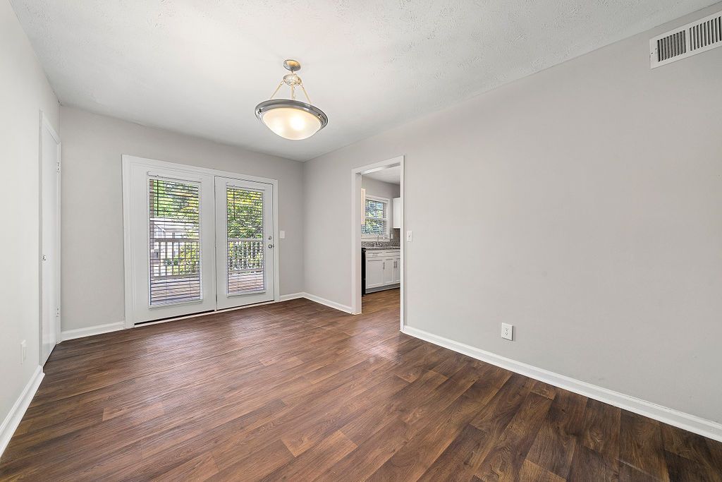 dining room with brushed nickel light fixture