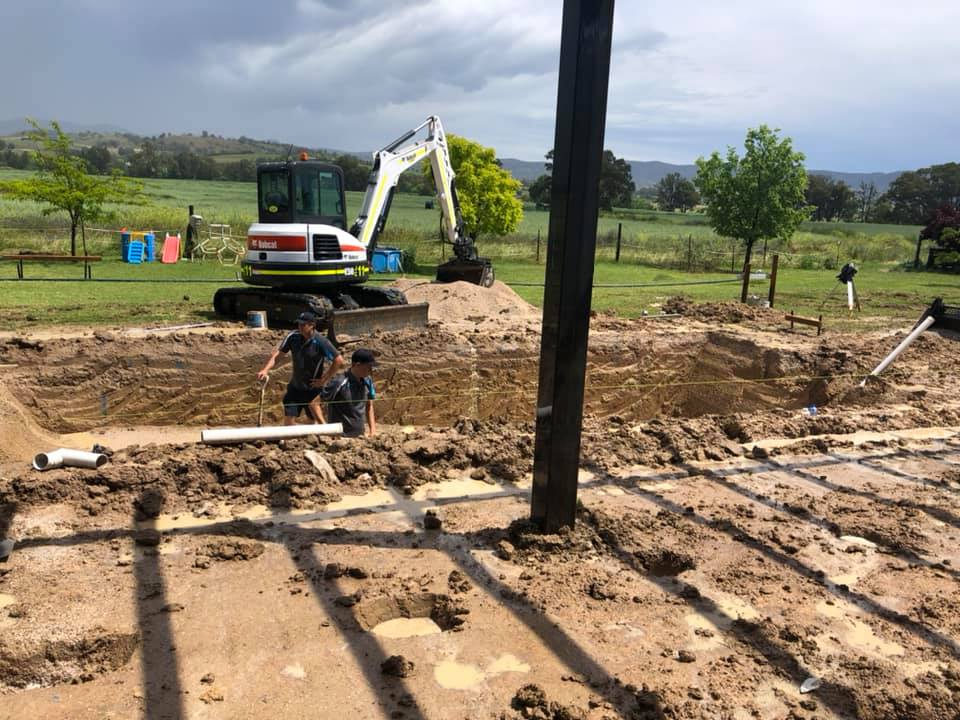 Two workers and bulldozer — Jaycee’s Constructions In  Mudgee NSW