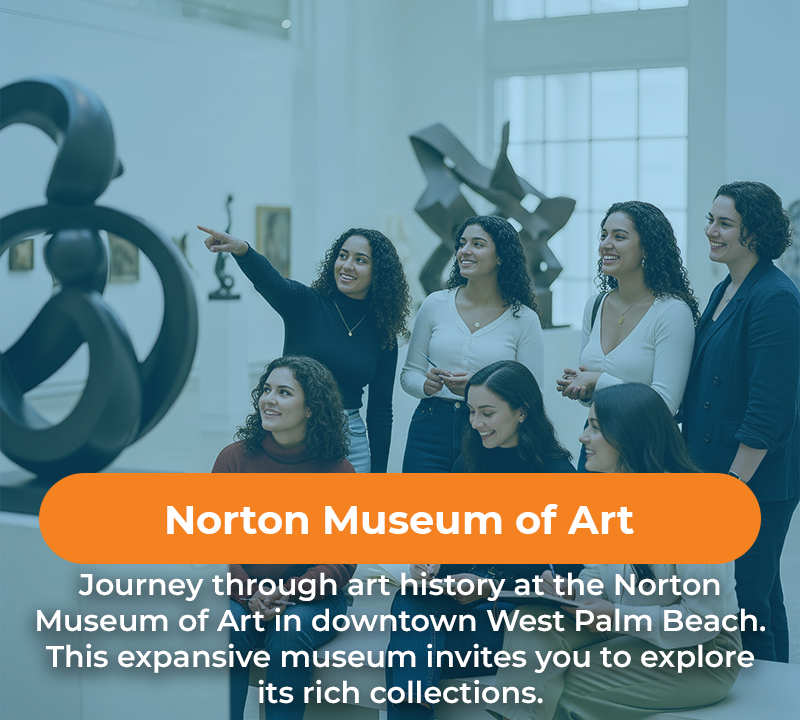 Group of people in art gallery, pointing at sculpture. 