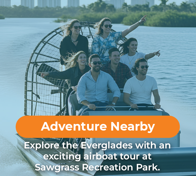People on an airboat explore the Everglades. 