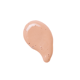 A close up of a swatch of liquid foundation on a white background.