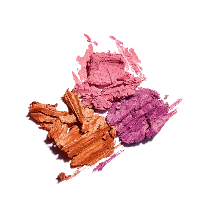 Three different shades of lipstick on a white background