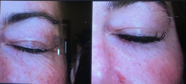 A close up of a woman 's face with her eyes closed.