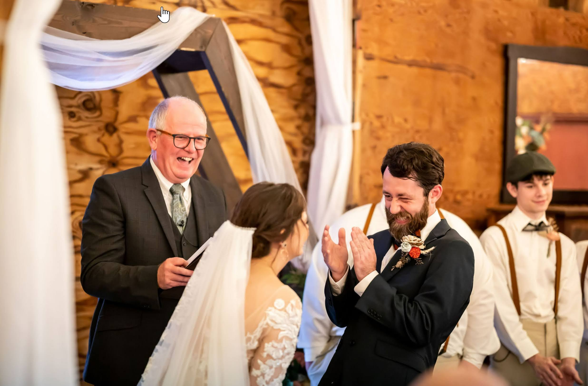Wedding officiant Andy Uhlig leading a story-filled ceremony with laughing groom and bride in Savannah, GA