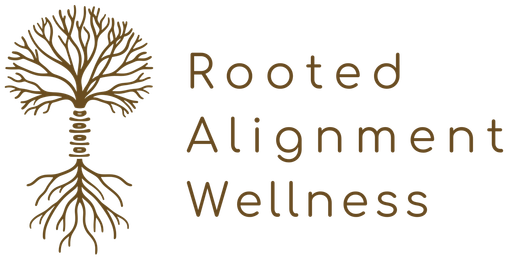 The logo for rooted alignment wellness shows a tree with roots coming out of it.