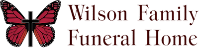 Logo of Wilson Family Funeral Home, with a butterfly-cross design and text in burgundy.