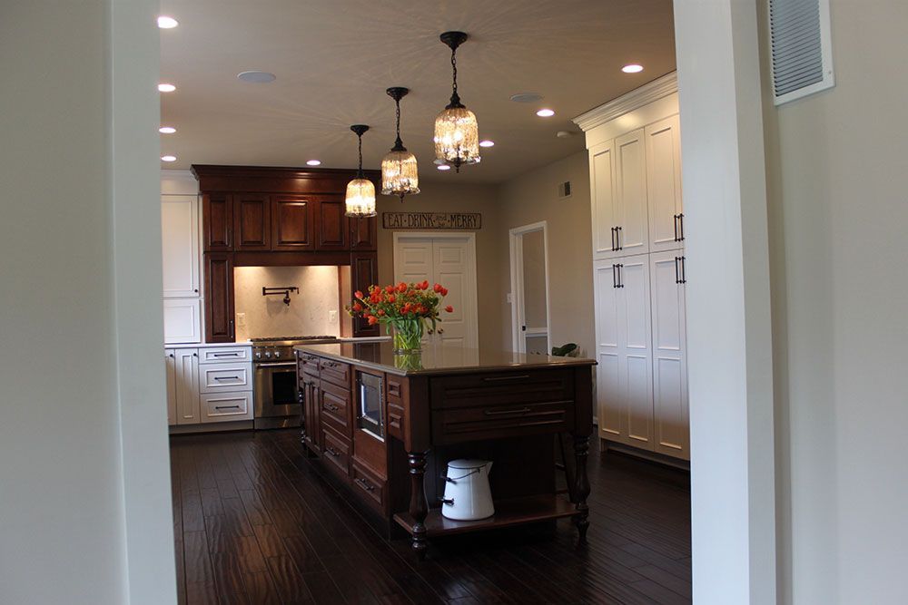 There is a large island in the middle of the kitchen.