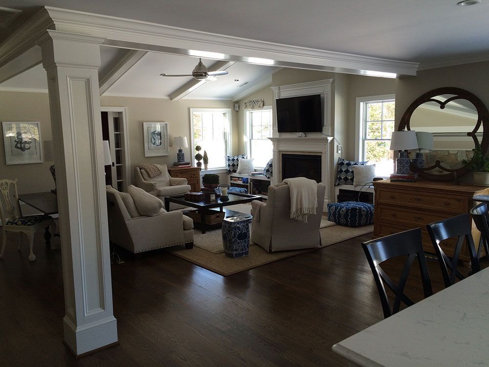 A living room filled with furniture and a fireplace