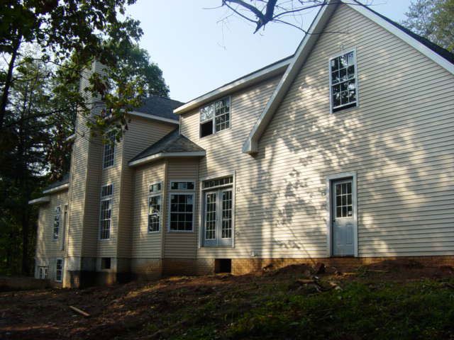A large house with a lot of windows and doors
