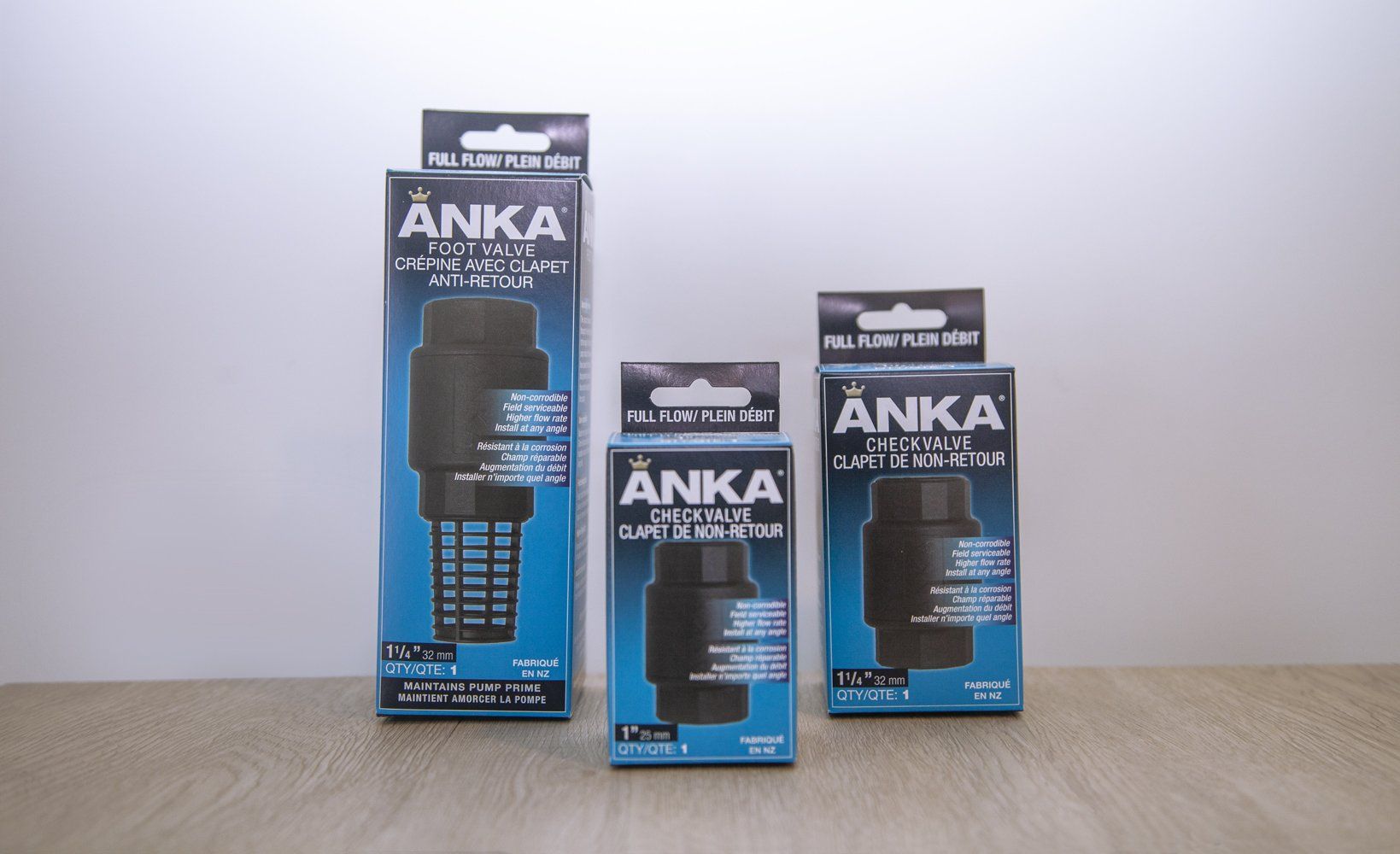 Three black Anka brand filter boxes standing in front of a white background.