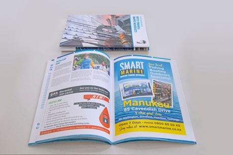 Open magazine with promotional material, and a cover on top. From Excel In Print Auckland.