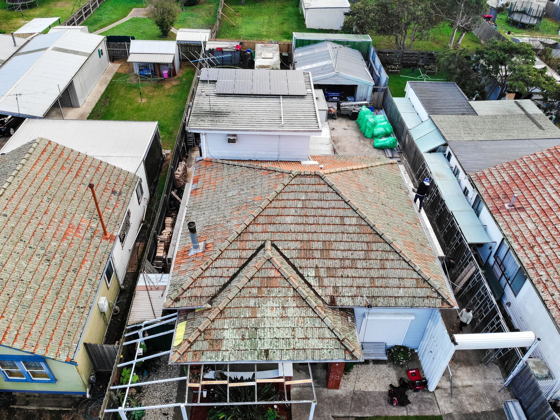 Before, worn concrete tile roof on period home, Williamstown VIC.