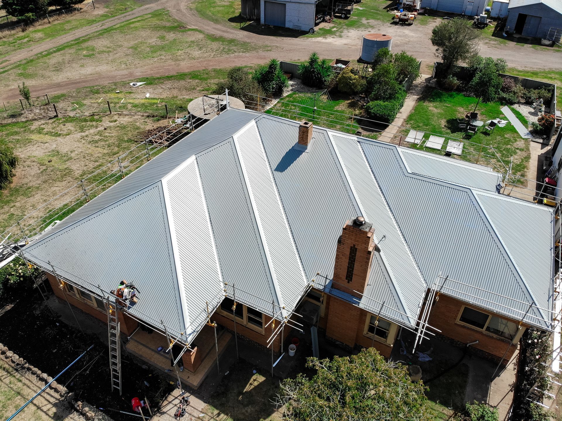 After, new Colorbond® metal roof in Monument on single-storey brick home, Alfredton VIC.