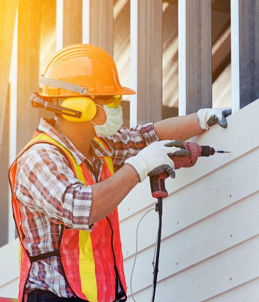 Professional Worker Wearing Complete Protective Equipment