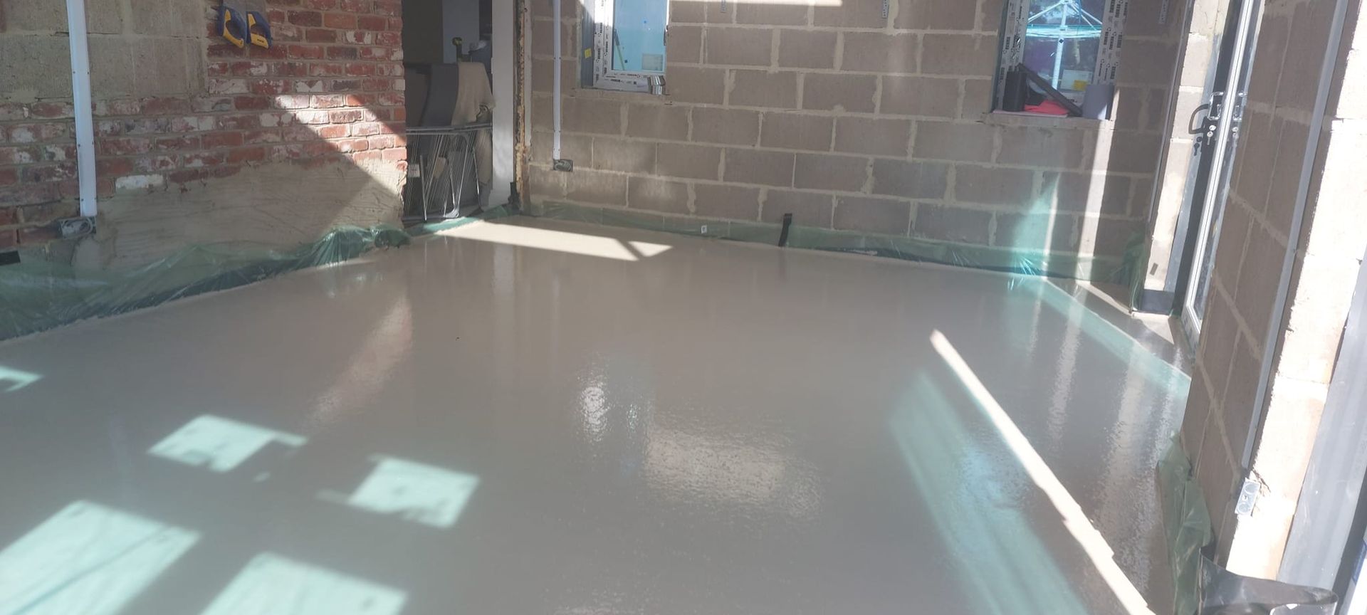 Images of Liquid flow screed preparation, delivery and installation, removing liquid flow screed laitance, pump hire, by JC Flow Screeds.