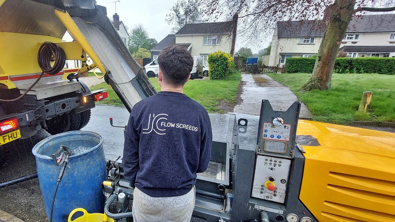 Colchester contractor - JC Flow Screeds - pumping liquid flow screed over heated flooring.