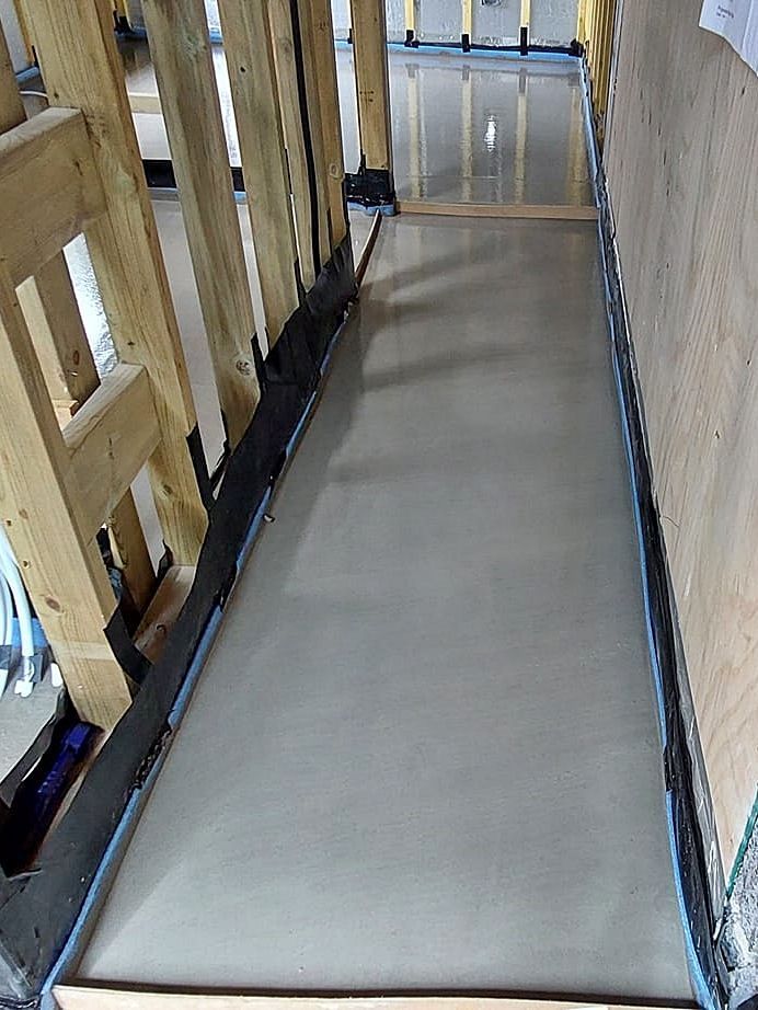 Images of Liquid flow screed preparation, delivery and installation, removing liquid flow screed laitance, pump hire, by JC Flow Screeds. Covering floors across East Anglia.